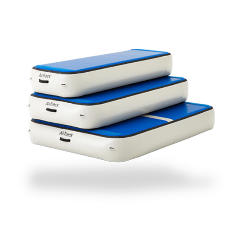 AirTrack AirStep inflatable training blocks in blue and white, stackable mats for gymnastics, cheerleading, and tumbling drills